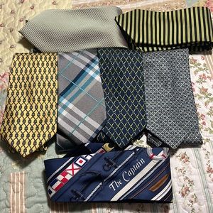 Men’s most silk ties.  Various brands see photos.  Lot of 7